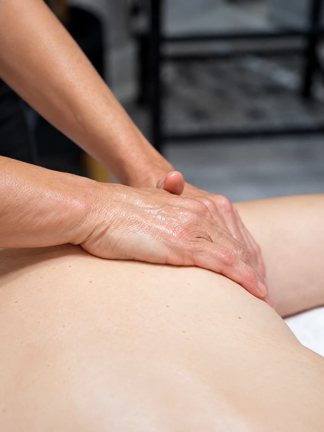 A slow, gliding stroke along the back